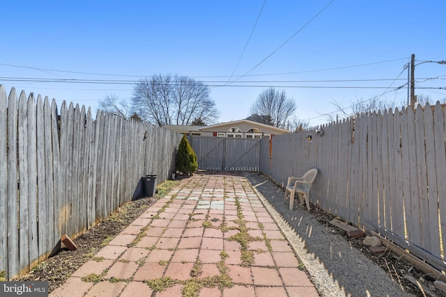 view of patio with a gate and a fenced backyard