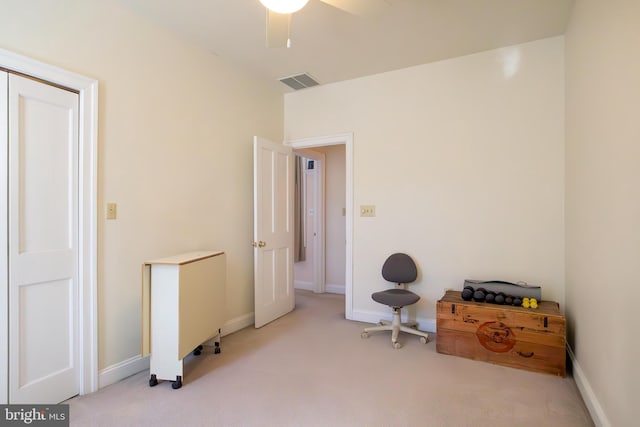 misc room with ceiling fan, carpet flooring, visible vents, and baseboards