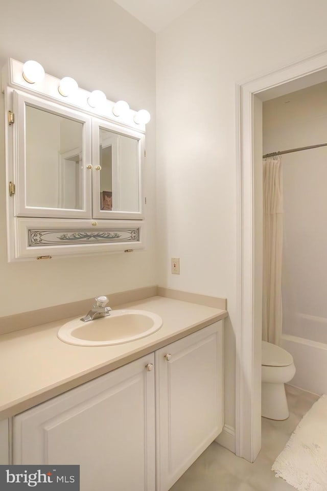 bathroom with toilet, shower / bath combination with curtain, and vanity