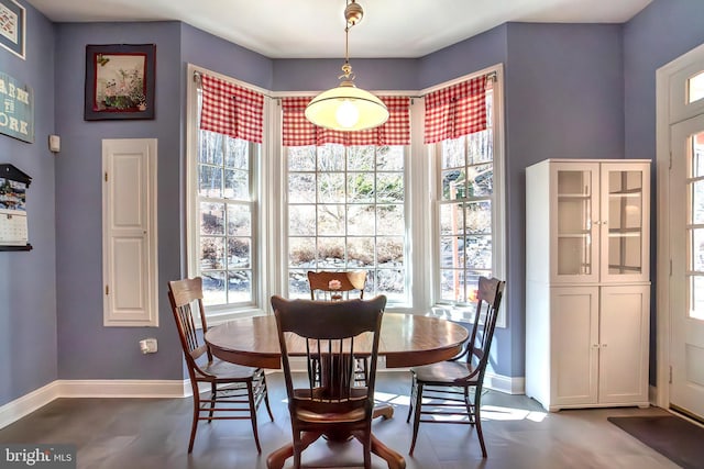 dining space with baseboards