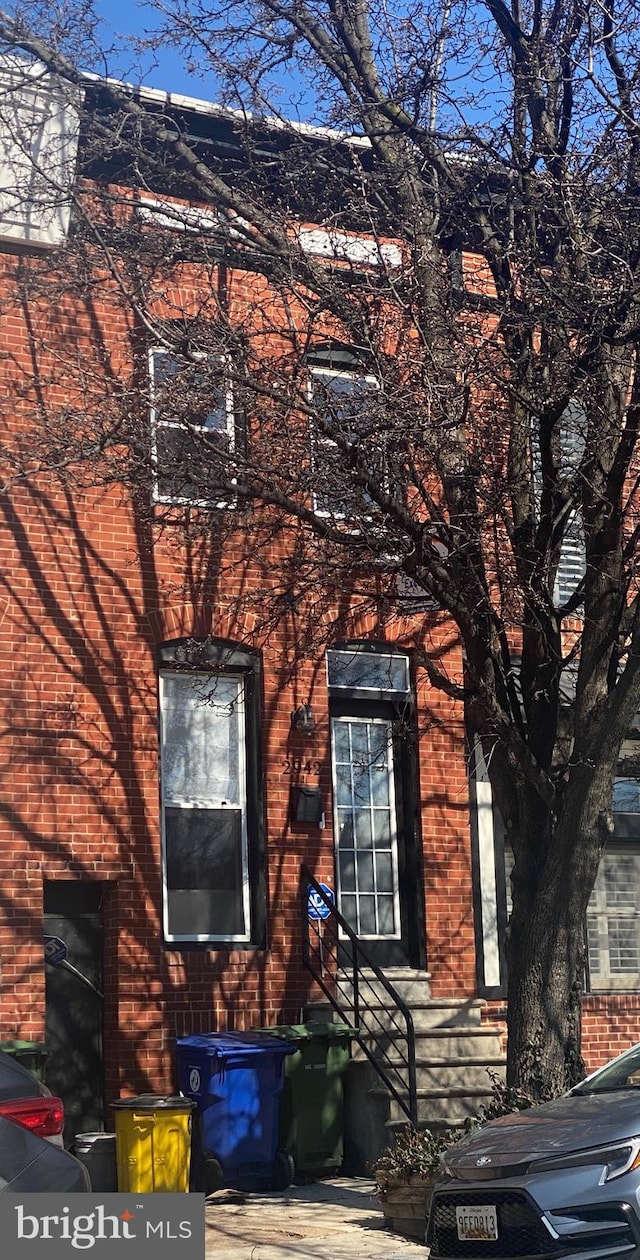 view of front of property with brick siding