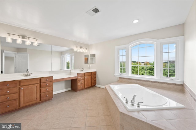 full bathroom with recessed lighting, visible vents, vanity, a jetted tub, and tile patterned floors