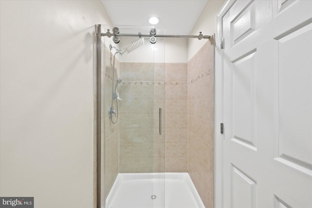 full bathroom with a stall shower