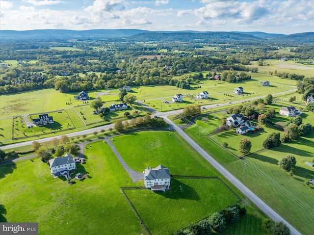 bird's eye view featuring a rural view and a mountain view