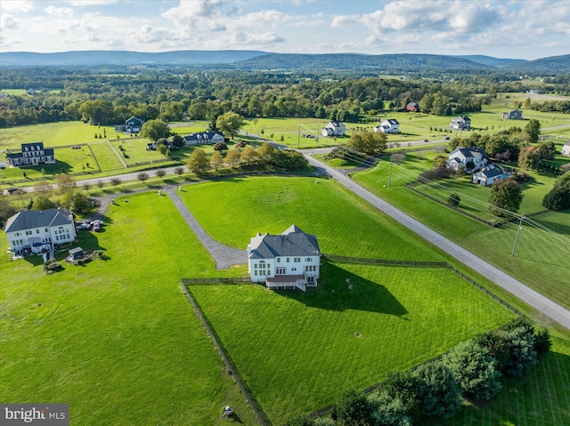 aerial view with a mountain view and a rural view