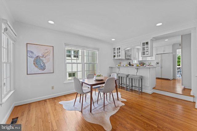 1733 Crestwood Dr, Alexandria, VA 22302 - dining room with recessed lighting, baseboards, a healthy amount of sunlight, and light wood-style floors