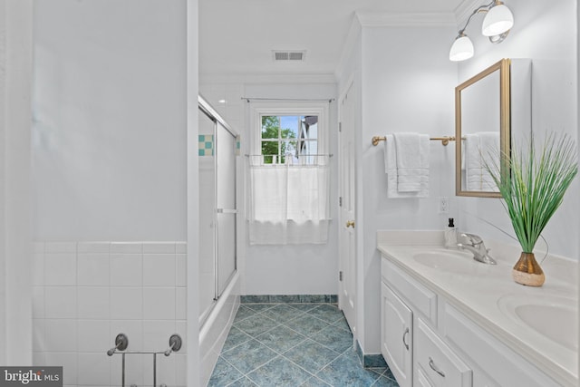 1733 Crestwood Dr, Alexandria, VA 22302 - full bath with crown molding, a sink, tile patterned flooring, a shower with shower door, and visible vents