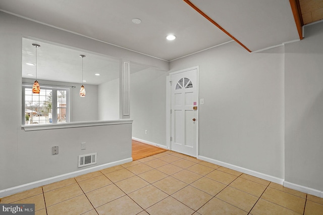 tiled entrance foyer featuring recessed lighting, baseboards, and visible vents