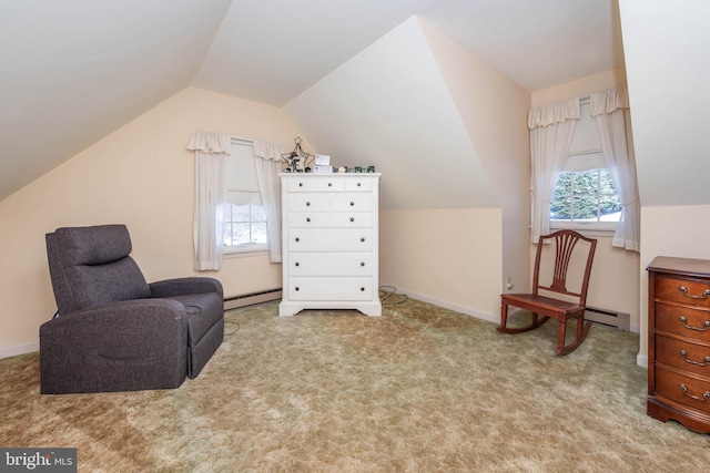 sitting room featuring a healthy amount of sunlight, carpet, a baseboard radiator, and vaulted ceiling