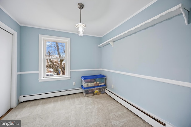 interior space with a baseboard radiator, a baseboard heating unit, carpet flooring, and ornamental molding