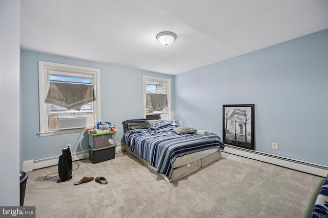 bedroom featuring carpet, a baseboard radiator, cooling unit, and baseboards