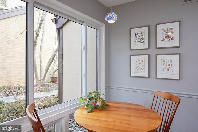 dining space featuring visible vents