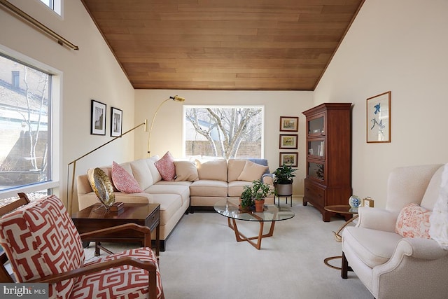 living room with high vaulted ceiling, wood ceiling, and light colored carpet