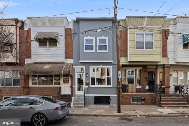 view of property featuring stucco siding