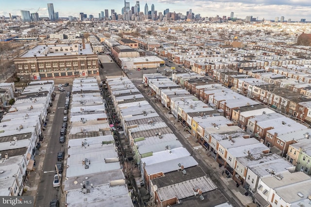 birds eye view of property with a city view