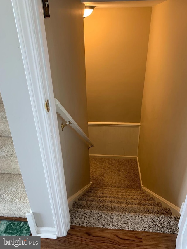 staircase with baseboards