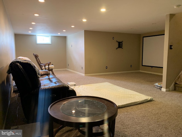 carpeted cinema with baseboards and recessed lighting