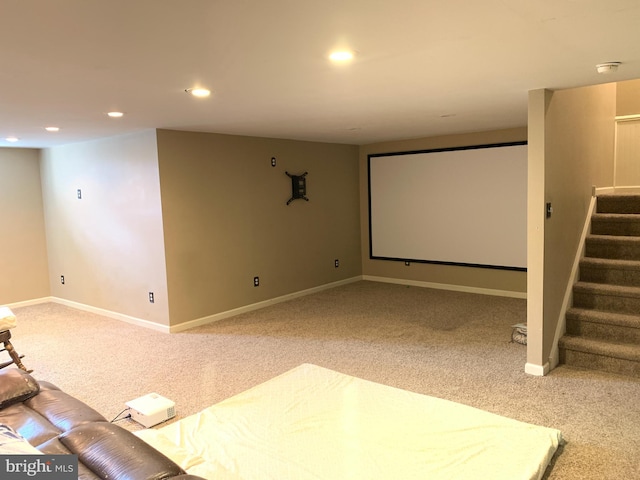 carpeted cinema room featuring baseboards and recessed lighting