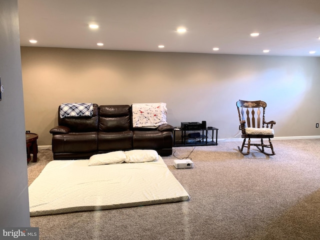 carpeted living room featuring recessed lighting and baseboards