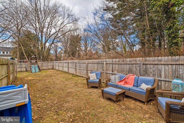 view of yard with a fenced backyard and a playground