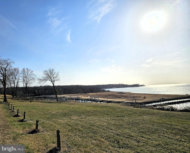 view of yard with a water view