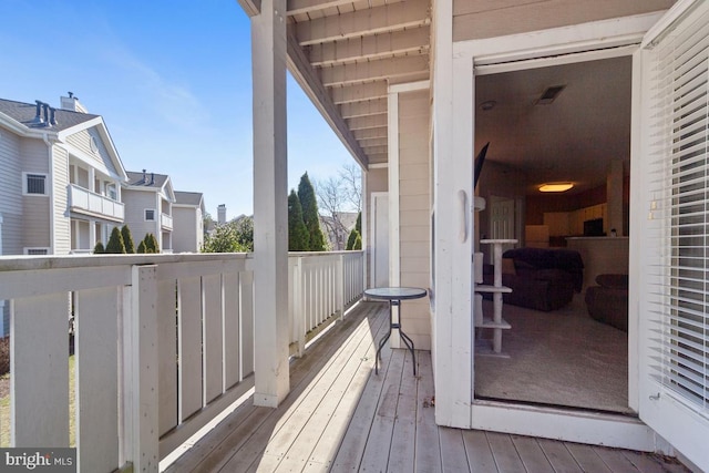 wooden deck with visible vents