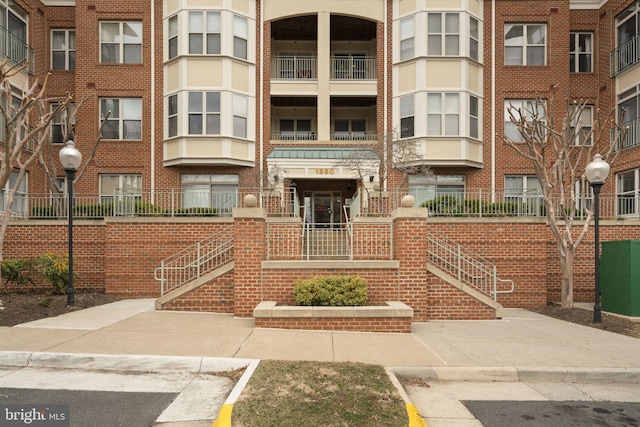 view of building exterior featuring stairs