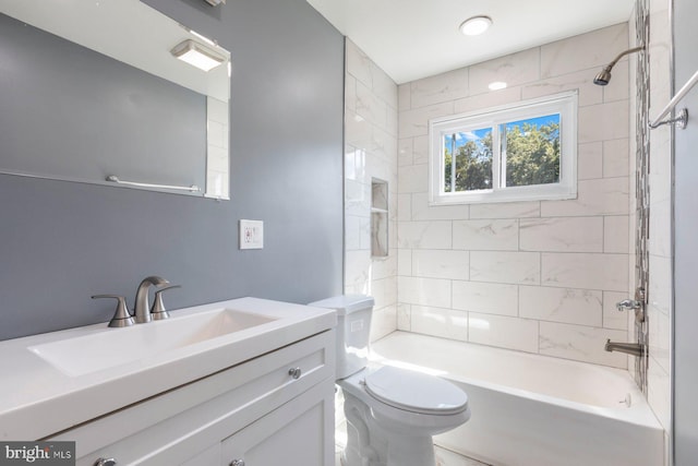 full bath with shower / bathtub combination, vanity, and toilet