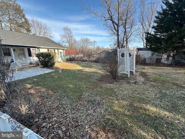 view of yard with fence