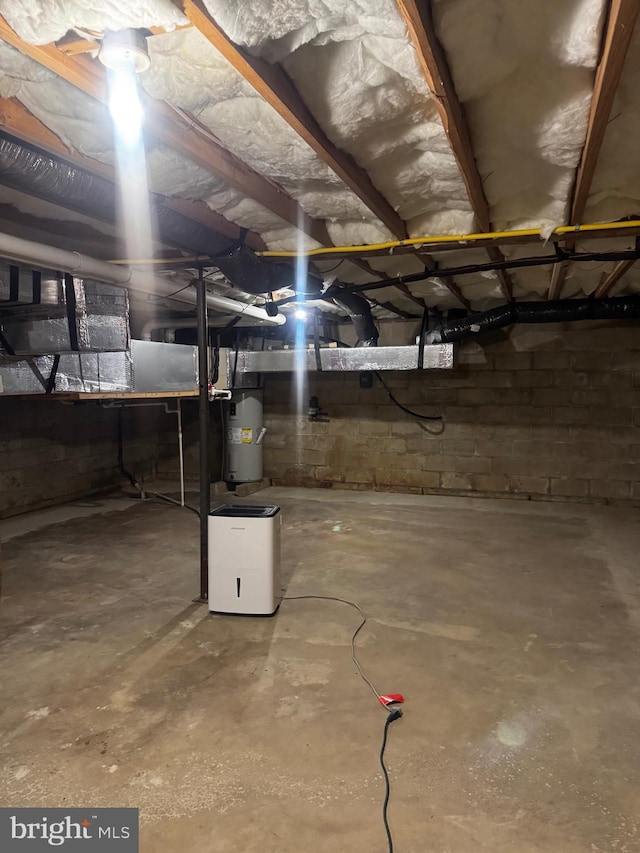 unfinished below grade area with electric water heater