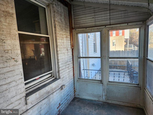 exterior space with lofted ceiling