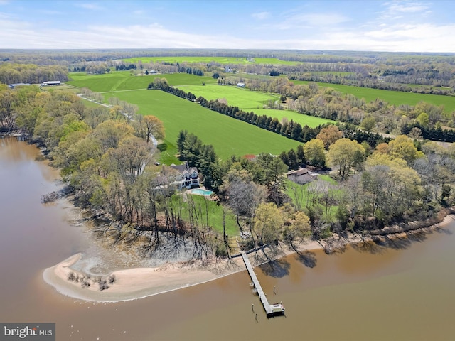 drone / aerial view featuring a water view and a rural view