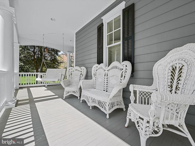 deck with covered porch