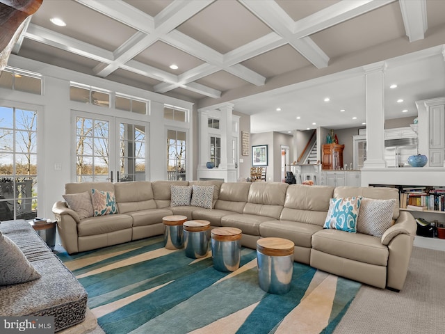carpeted living room featuring decorative columns, beam ceiling, and recessed lighting