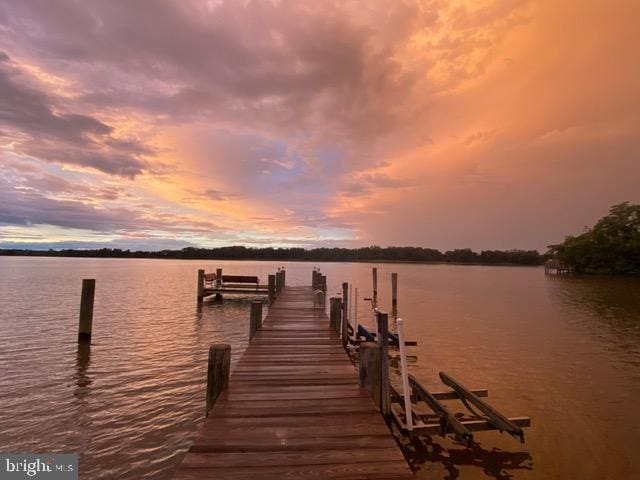 dock area featuring a water view