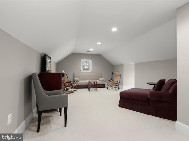 interior space featuring carpet floors, baseboards, recessed lighting, and lofted ceiling