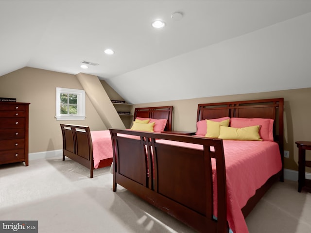 carpeted bedroom with visible vents, baseboards, vaulted ceiling, and recessed lighting