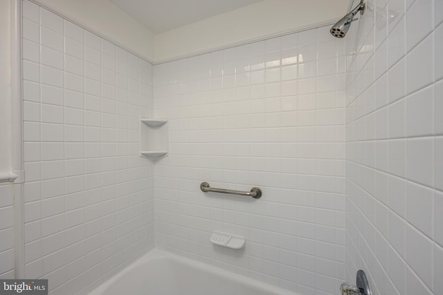 bathroom featuring bathtub / shower combination