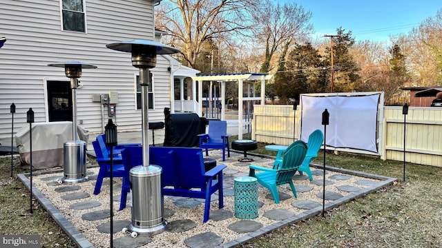 view of patio / terrace featuring fence