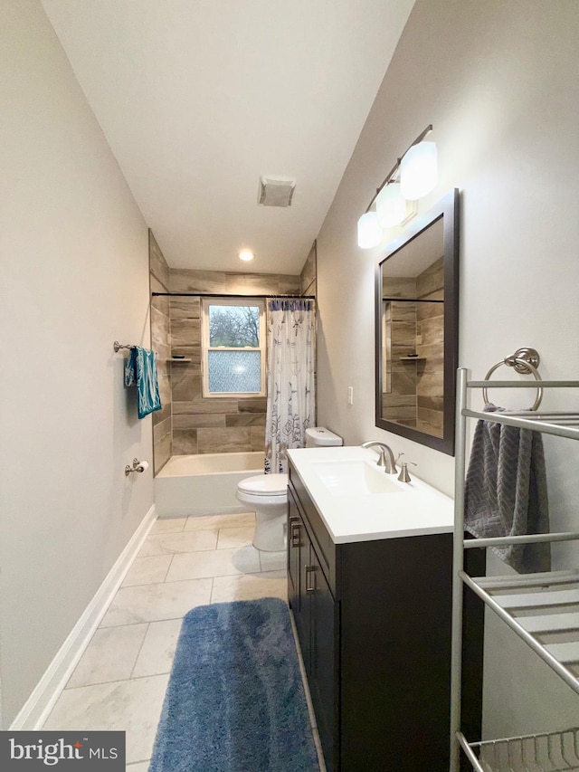 bathroom featuring visible vents, toilet, shower / tub combo, baseboards, and vanity