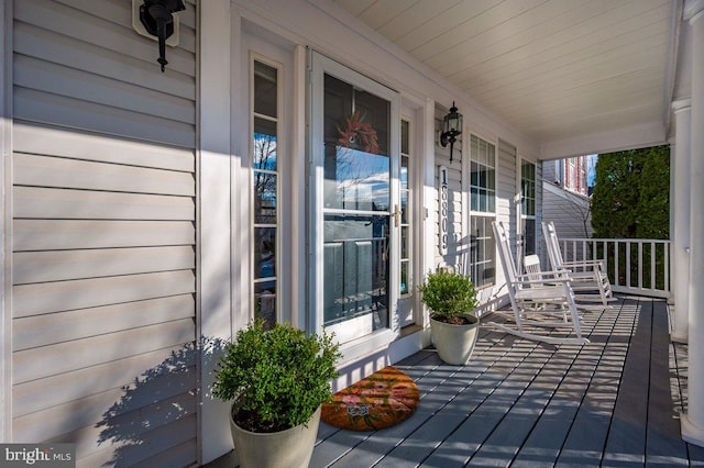 wooden deck featuring a porch