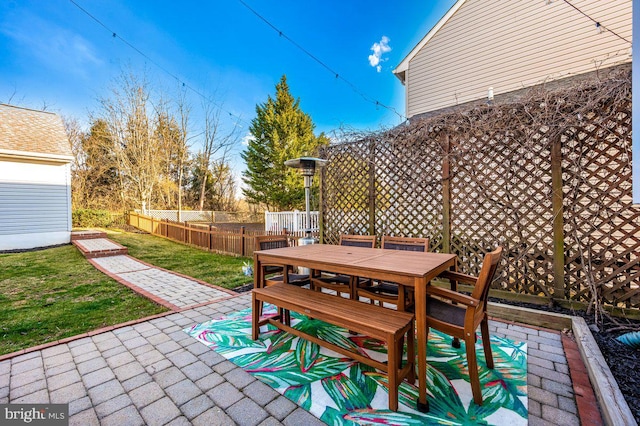 view of patio / terrace featuring fence private yard and outdoor dining space