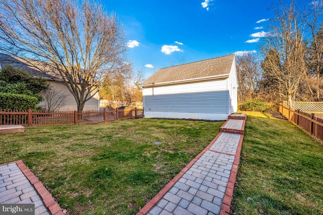 view of yard with a fenced backyard