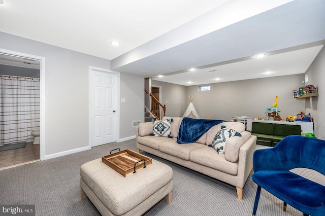 living area featuring carpet, stairs, baseboards, and recessed lighting