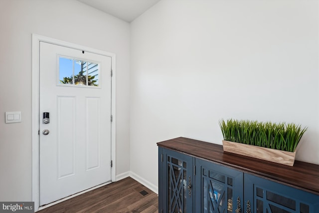 348 Tyson Dr, Berryville, VA 22611 - entrance foyer with dark wood finished floors and baseboards