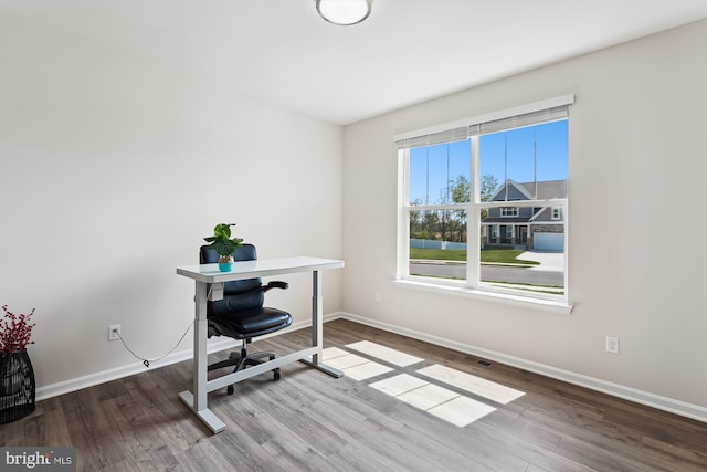 348 Tyson Dr, Berryville, VA 22611 - office area featuring baseboards and wood finished floors