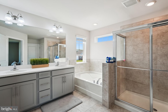 348 Tyson Dr, Berryville, VA 22611 - bathroom with a shower stall, a garden tub, double vanity, recessed lighting, and tile patterned floors