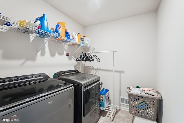 348 Tyson Dr, Berryville, VA 22611 - washroom with washing machine and clothes dryer and baseboards