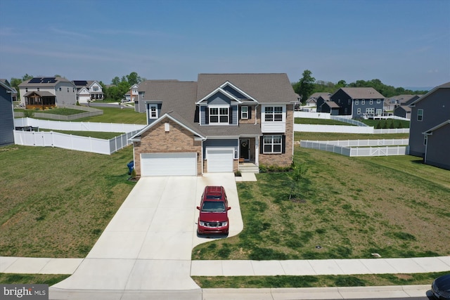 348 Tyson Dr, Berryville, VA 22611 - view of front of home featuring driveway, a residential view, brick siding, and a garage