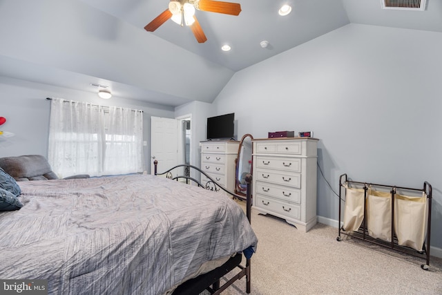 bedroom featuring light carpet, vaulted ceiling, baseboards, and ceiling fan